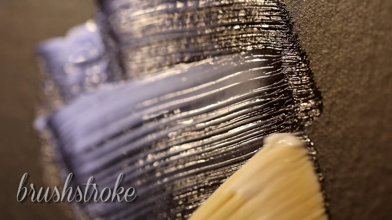Close view of physical texture on a portrait canvas during brushwork